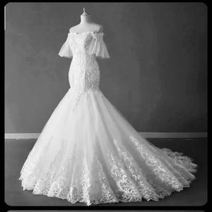 New wedding dress size 16 but it can easily be adjusted to any size